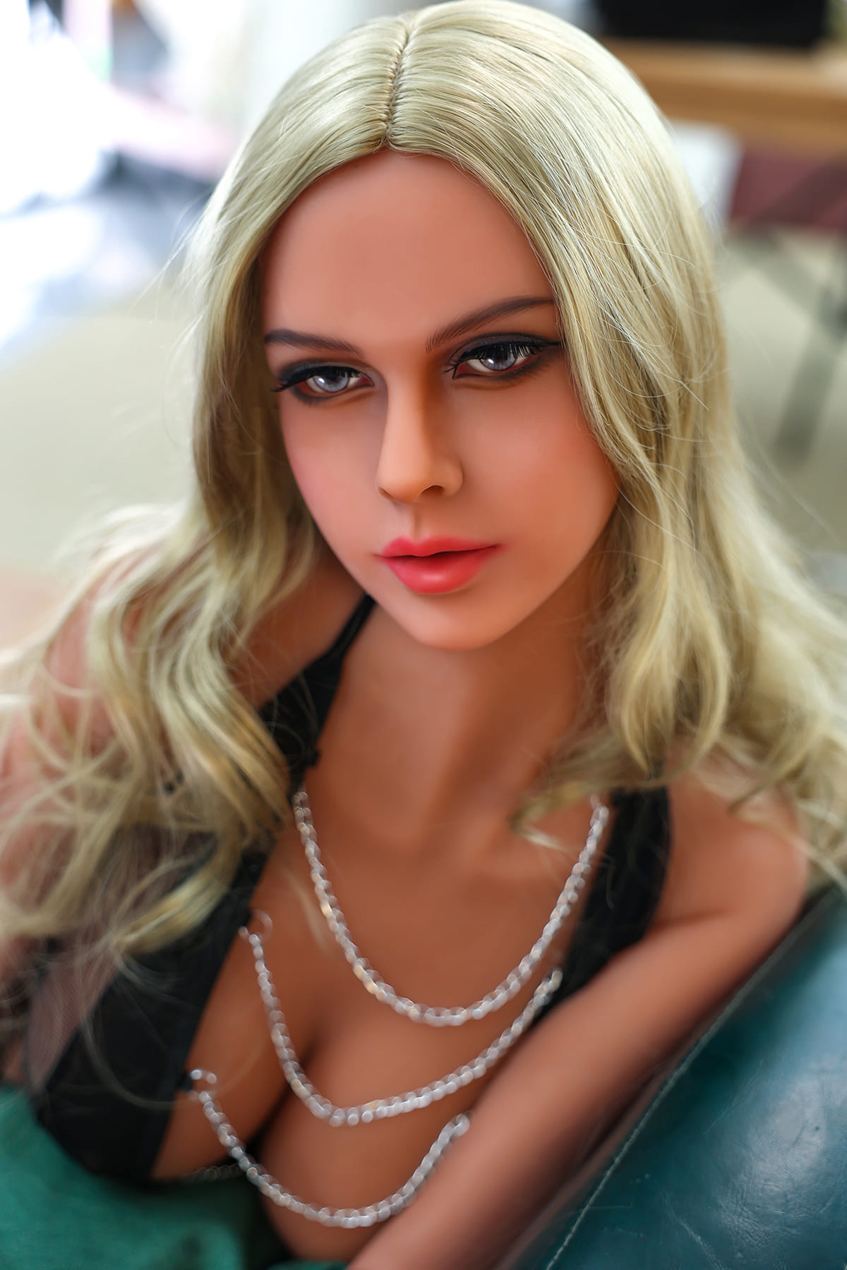 Blonde adult size sex doll with cleavage