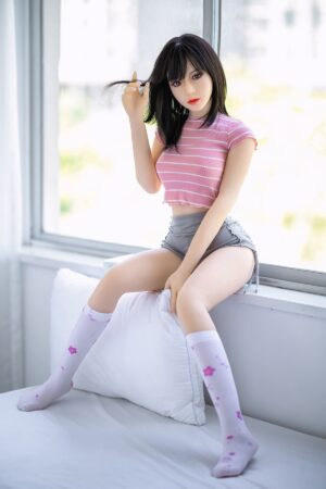 Adult size fair skinned Korean sex doll sitting on the windowsill
