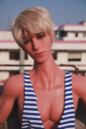 Male sex doll with short blond hair in a striped vest