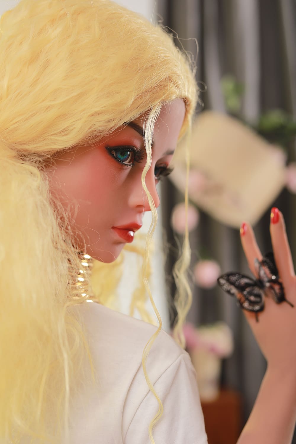Cute blonde blue eyed sex doll